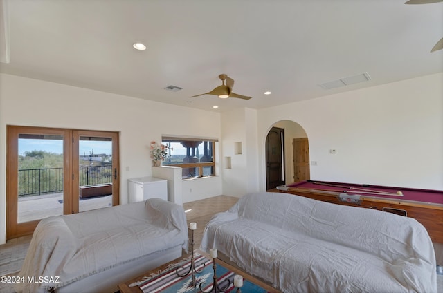 bedroom with ceiling fan, billiards, and access to outside