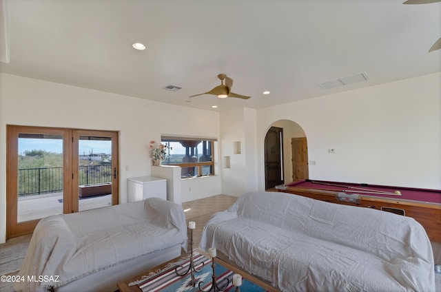 4423 N Osage Dr, Tucson, AZ 85718 - bedroom featuring arched walkways, visible vents, access to exterior, and recessed lighting