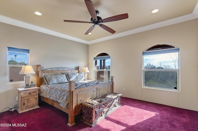 carpeted bedroom with crown molding, a ceiling fan, and recessed lighting