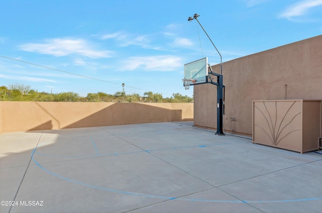 view of patio / terrace with basketball hoop