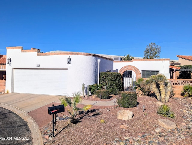 view of front of property featuring a garage