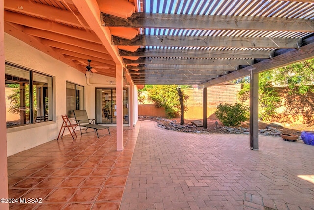 view of patio featuring ceiling fan and a pergola