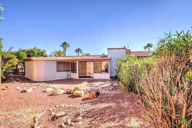 back of house featuring a patio