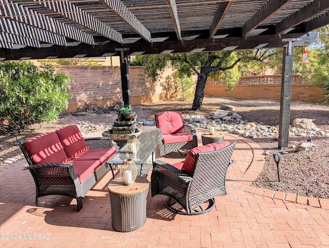 view of patio with a pergola and an outdoor hangout area