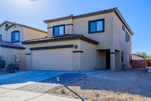 view of front of property with a garage