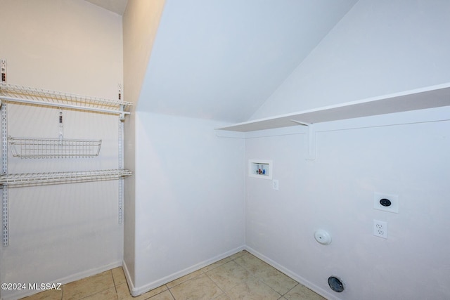 clothes washing area featuring hookup for an electric dryer, hookup for a washing machine, and hookup for a gas dryer