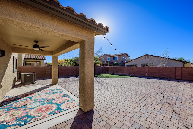 view of patio / terrace with ceiling fan and cooling unit