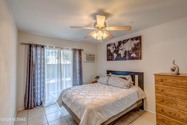 bedroom with a wall unit AC, ceiling fan, and light tile patterned floors