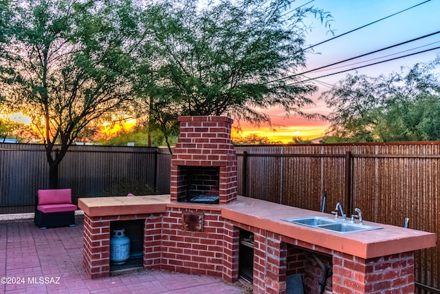 patio terrace at dusk with sink