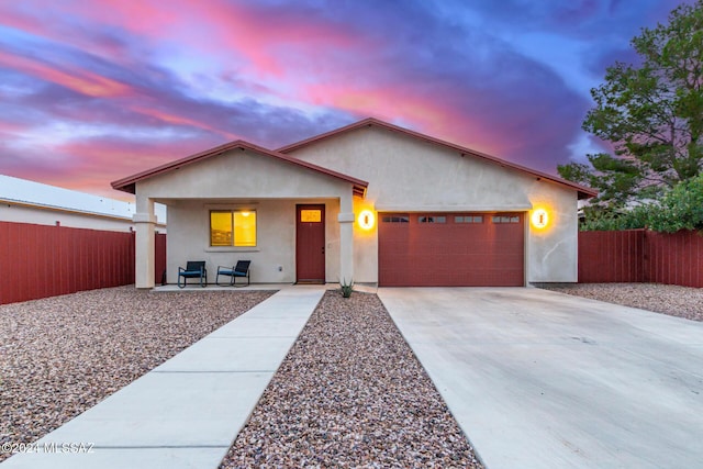 view of front of property featuring a garage