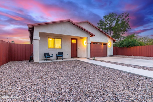 view of front of home with a garage