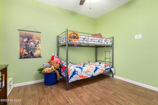 bedroom featuring hardwood / wood-style floors and ceiling fan