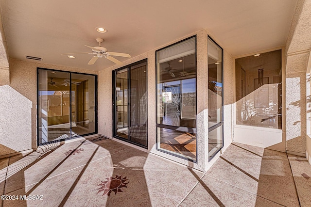 view of patio / terrace with ceiling fan