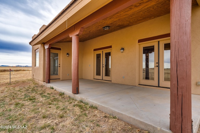 view of patio featuring french doors