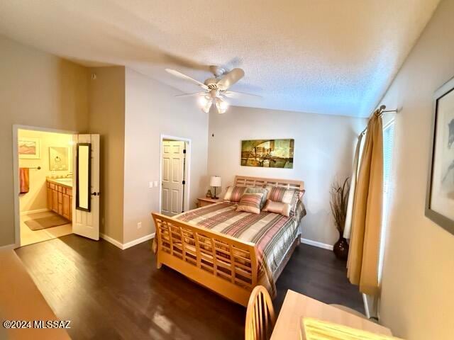 bedroom with dark hardwood / wood-style flooring, ensuite bath, a textured ceiling, vaulted ceiling, and ceiling fan