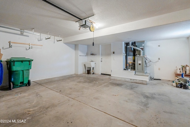 garage with heating unit and a garage door opener