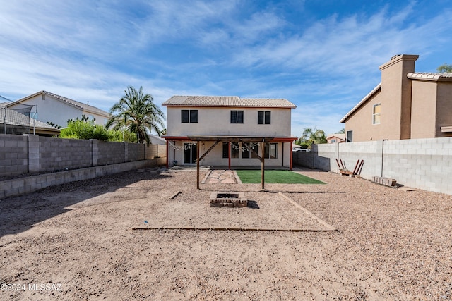 rear view of house with a patio area