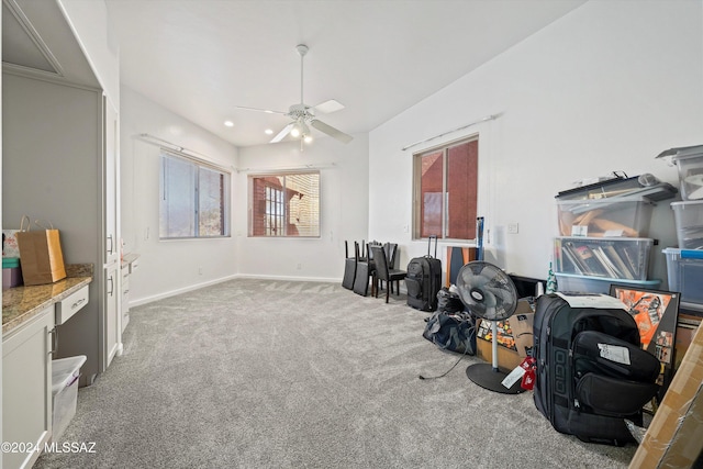 misc room with ceiling fan and carpet floors