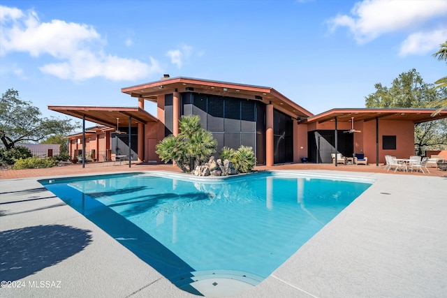 view of swimming pool featuring a patio