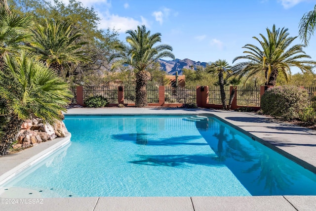 view of pool featuring a mountain view