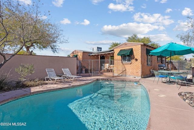 view of pool with a patio