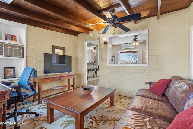 living room featuring an AC wall unit, beamed ceiling, wood ceiling, and brick wall