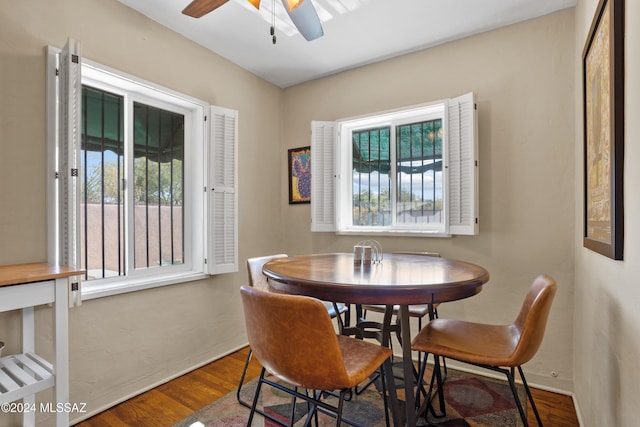 dining space featuring hardwood / wood-style floors, a wealth of natural light, and ceiling fan