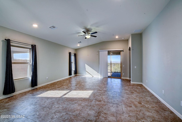 unfurnished room featuring vaulted ceiling and ceiling fan