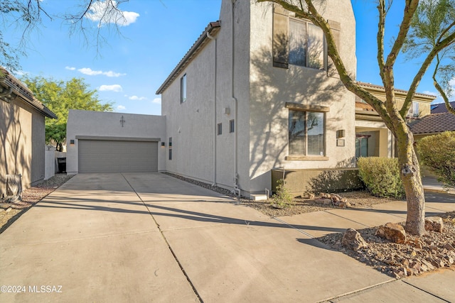 view of home's exterior featuring a garage