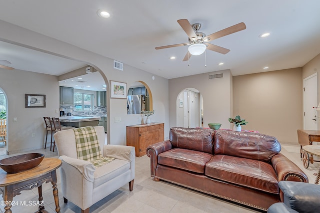 living room with ceiling fan