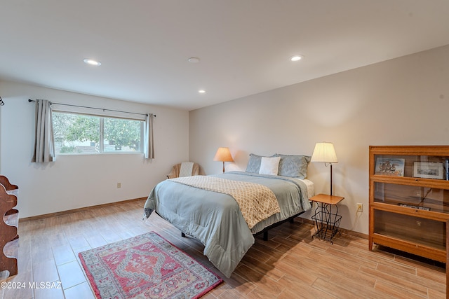 bedroom featuring light wood-type flooring