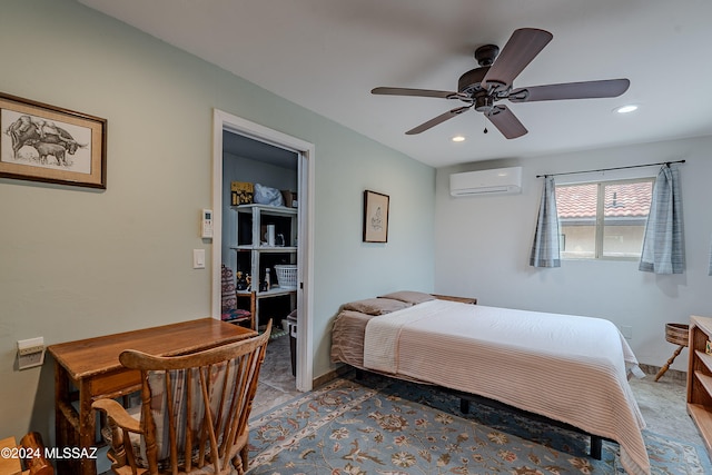 bedroom featuring an AC wall unit and ceiling fan