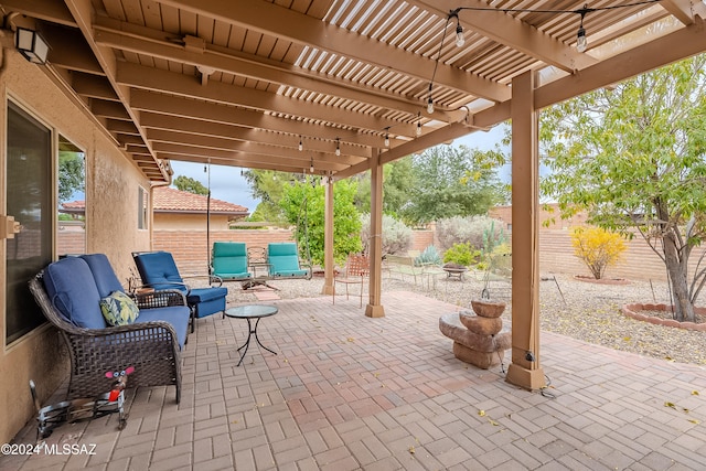 view of patio featuring a pergola