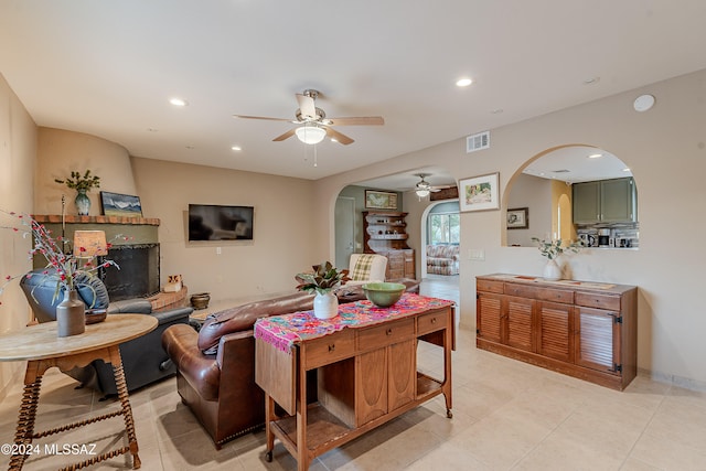 living room featuring ceiling fan