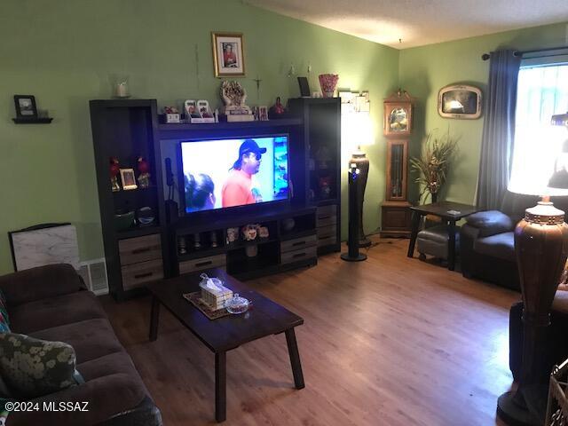 living room with hardwood / wood-style floors