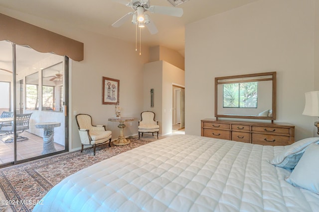 bedroom featuring ceiling fan and access to exterior