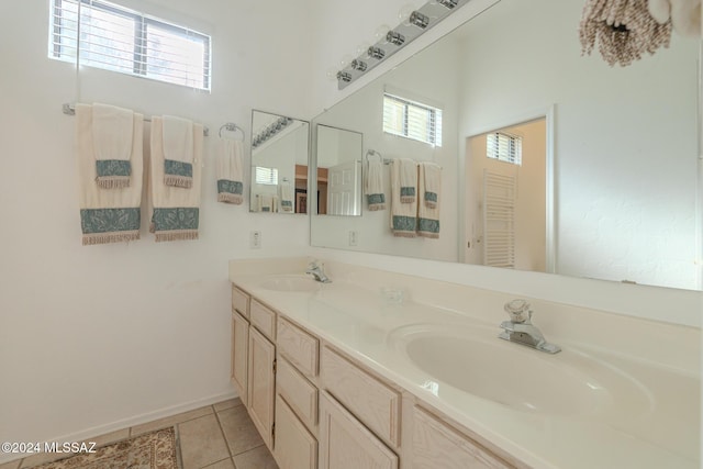 bathroom with vanity and tile patterned floors