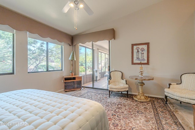 bedroom with access to outside, multiple windows, ceiling fan, and lofted ceiling