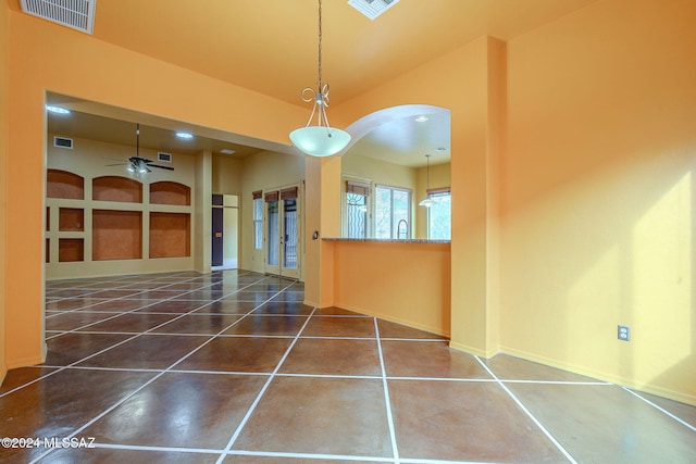 interior space with dark tile patterned flooring