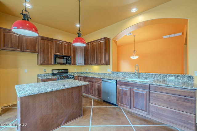 kitchen with kitchen peninsula, sink, black appliances, decorative light fixtures, and light tile patterned flooring