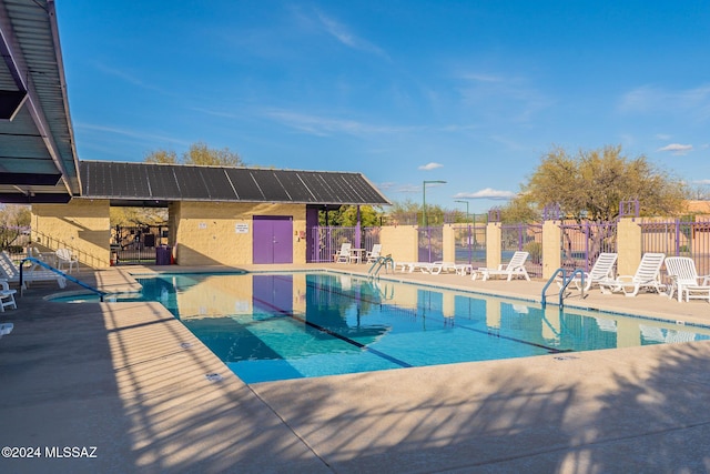 view of pool featuring a patio