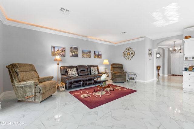 living room with crown molding and a notable chandelier