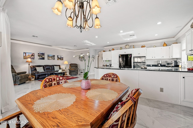 dining space featuring an inviting chandelier and ornamental molding