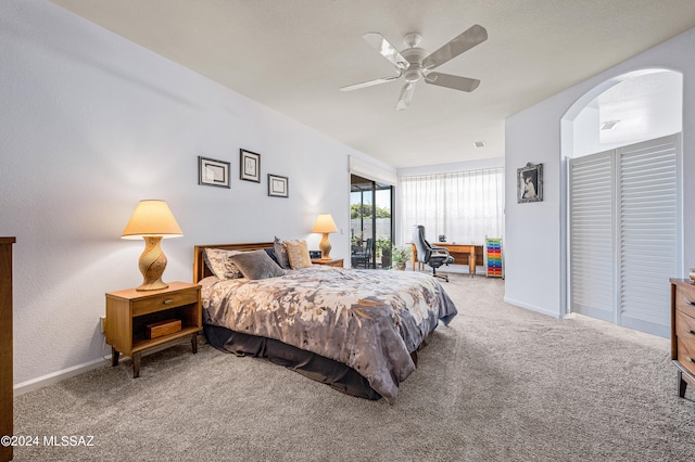 bedroom featuring ceiling fan and carpet floors