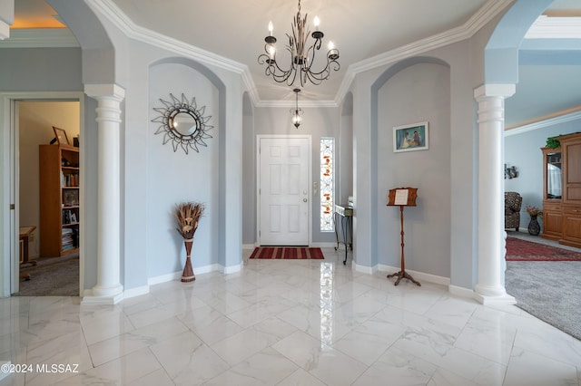 carpeted foyer entrance with a healthy amount of sunlight, crown molding, and an inviting chandelier