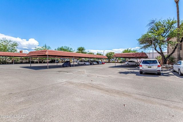 view of car parking featuring a carport