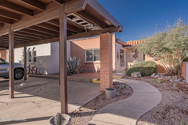 view of patio featuring a carport