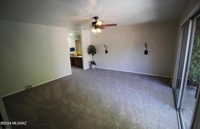 carpeted empty room with ceiling fan