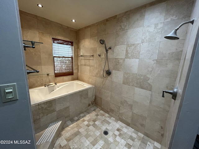 bathroom featuring plus walk in shower