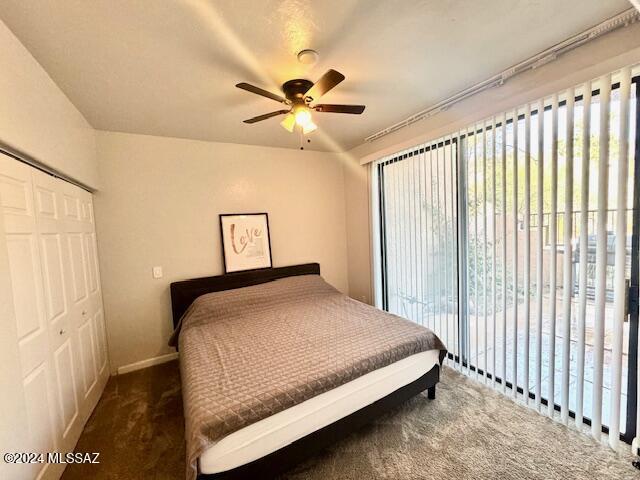 bedroom with carpet, access to outside, a closet, and ceiling fan